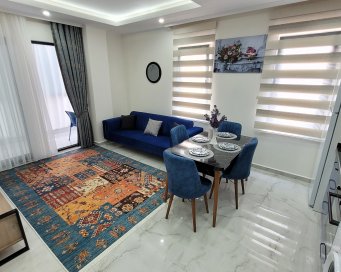 Новые апартаменты в одном из популярных районов Алании Махмутлар